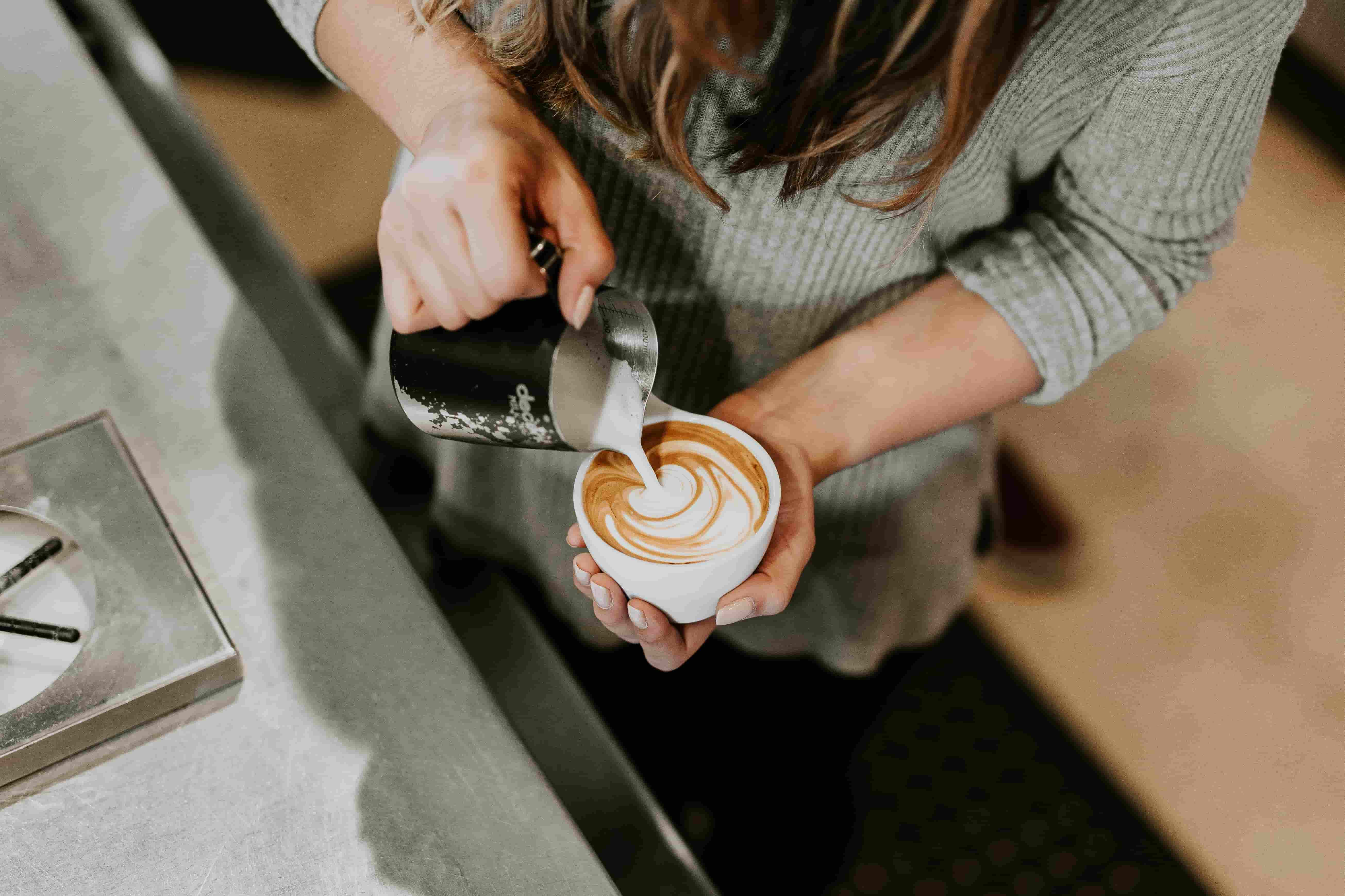 a barista making coffee